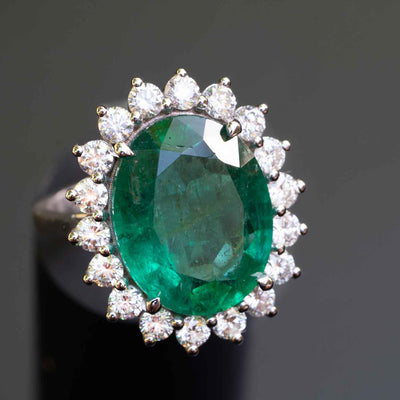 princess diana ring emerald gold diamonds