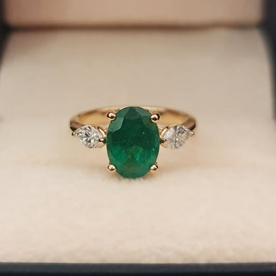 3 carat natural green emerald engagement ring with diamonds in yellow gold