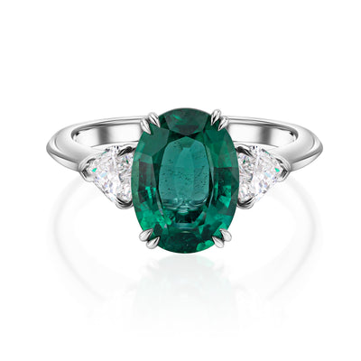 3.00 carat natural oval emerald ring with heart shaped diamonds