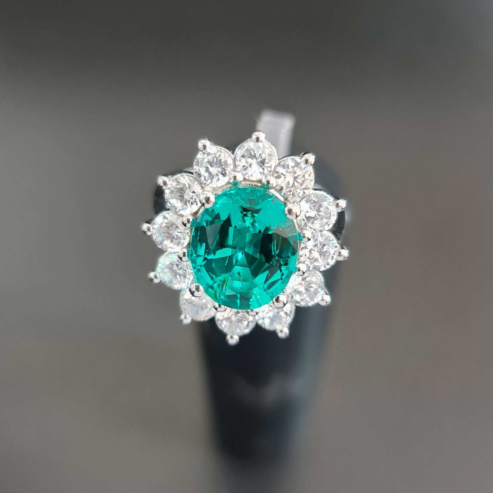 princess diana engagement ring emerald with diamonds