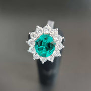 anillo de compromiso princesa diana esmeralda con diamantes