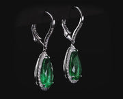 4.39 Carat Pear Shaped Emerald Cut Earrings with 0.33 Natural Diamonds
