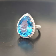 natural blue topaz ring with diamonds white gold