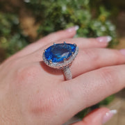 Brianna - 18.00 carat natural swiss blue topaz ring with 1.20 carat diamonds