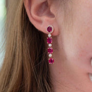 Penina - 6.57 ct oval ruby earrings with 0.78 carat natural diamonds
