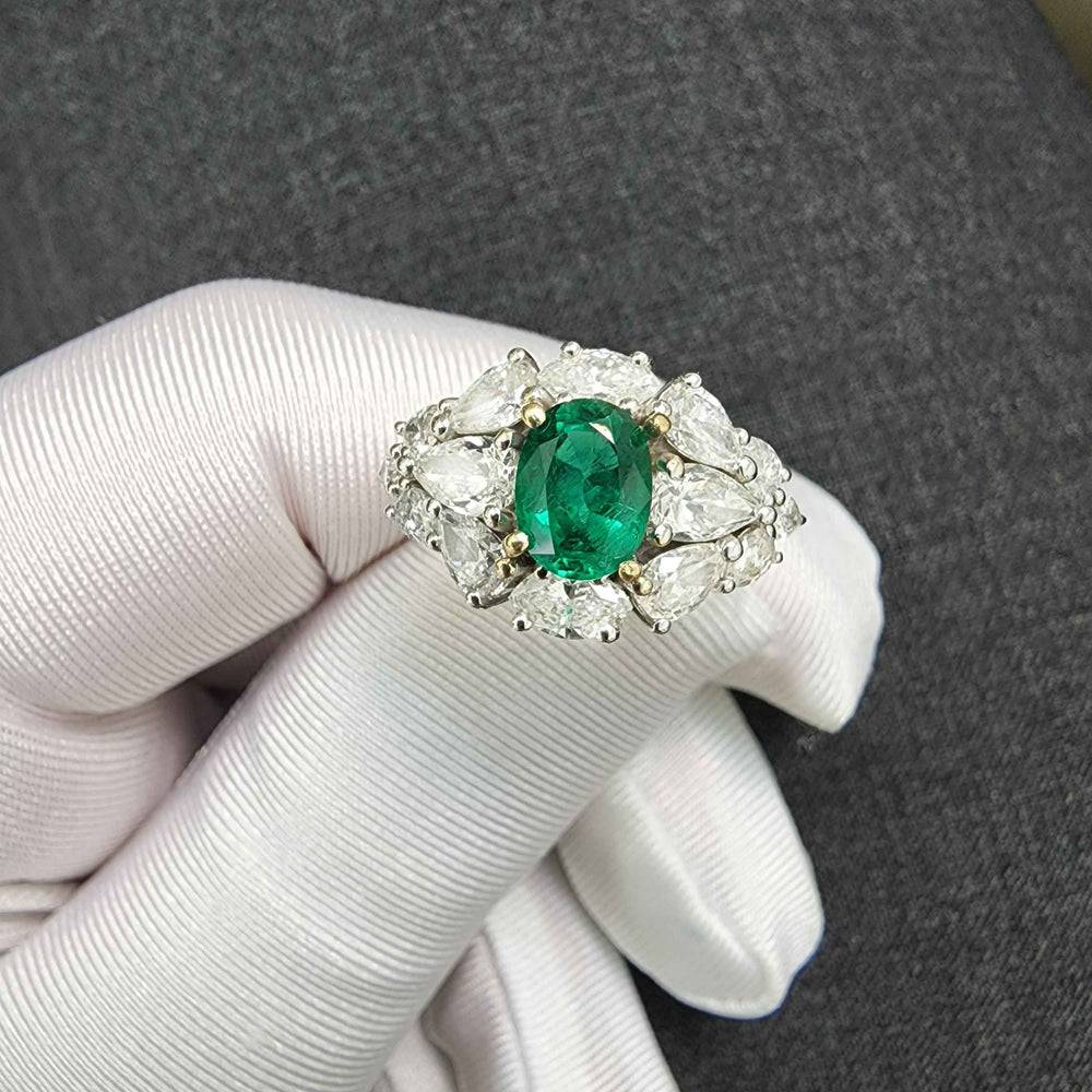 green emerald diamond ring
