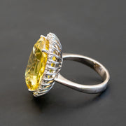 Carole - 21.00 carat oval yellow sapphire ring with 1.00 carat natural diamonds