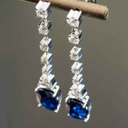 drop sapphire earrings with diamonds