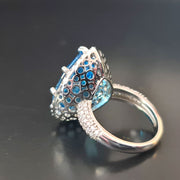 vintage blue topaz ring with diamonds white gold