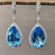 aretes de diamantes con topacio azul