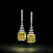 elegantes aretes de diamantes amarillos para mujer