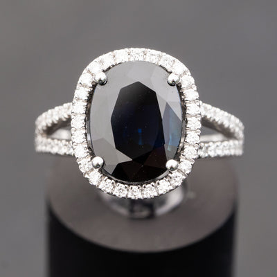 deep blue natural sapphire and diamond engagement ring