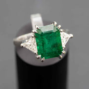 green emerald ring 3 stone