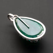 25.60 carat natural green emerald pendant with 0.65 carat natural diamond