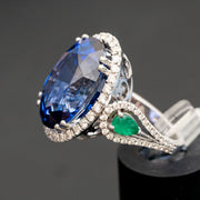 Adalene - 27.28 carat oval sapphire ring with 1.04 carat natural diamonds