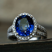 Margot - 6.31 carat oval sapphire ring with 0.66 carat natural diamonds