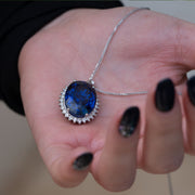 Domenica - 23.00 carat oval sapphire pendant with 0.95 carat natural diamonds