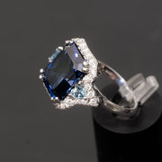 Suzanne - anillo de zafiro de 13.18 quilates con diamantes naturales de 0.80 quilates y topacio de 0.70 quilates