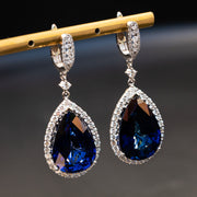Andrea - 24.00 carat pear sapphire earrings with 1.31 carat natural diamonds