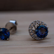sapphire earrings halo or solitaire