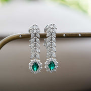 fine green oval emerald earrings with diamonds 18K white gold