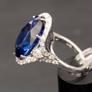anillo de diamantes con zafiro azul