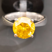 anillo de diamantes amarillo naranja